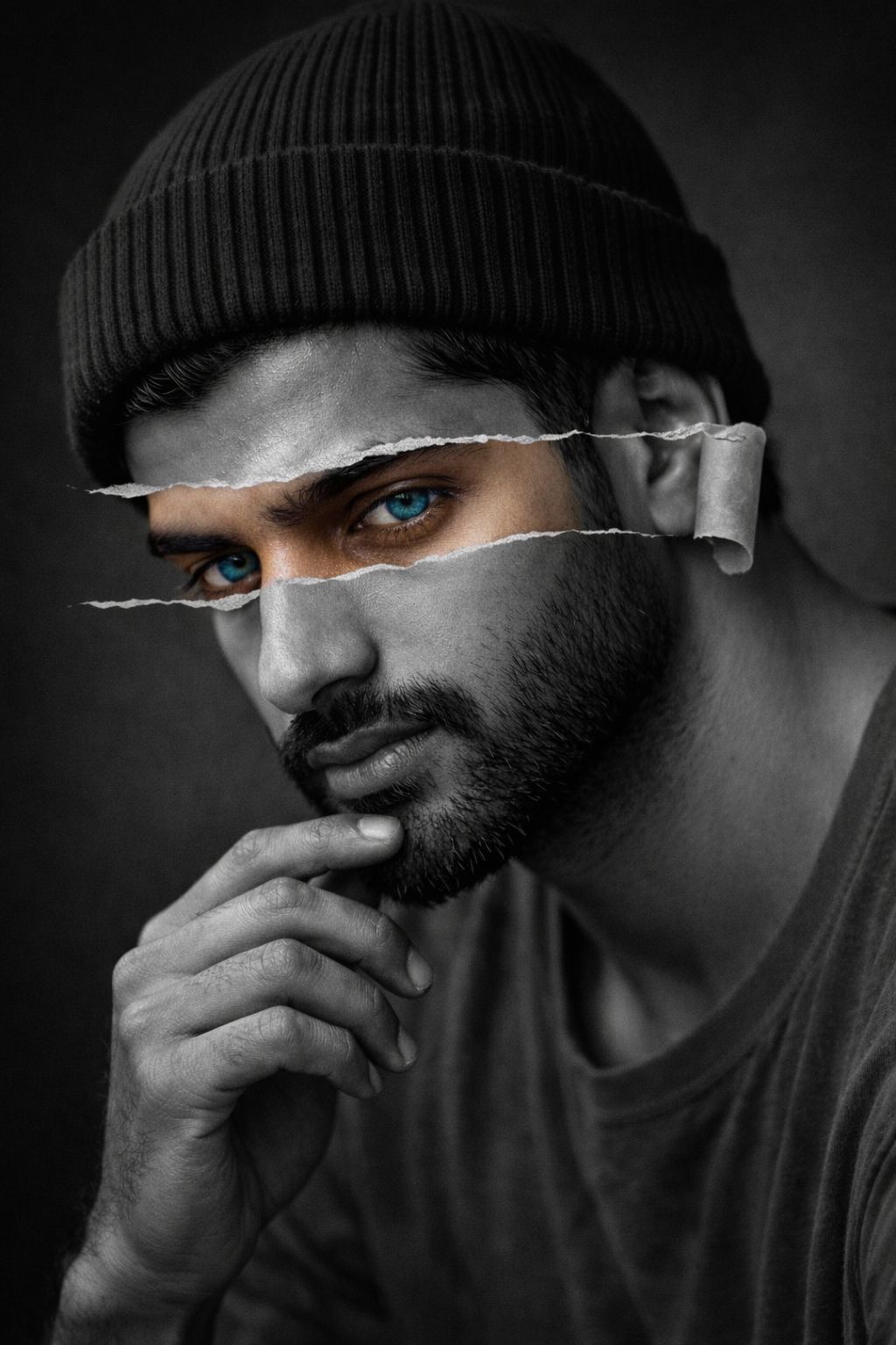 Ultra-realistic cinematic black-and-white portrait of a young South Asian man, maintaining strict fa