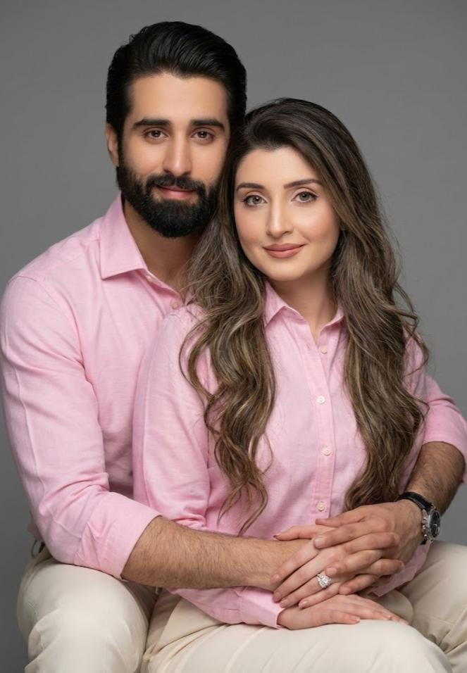 Create a hyper-realistic 8K close-up body portrait of a couple, using the uploaded photo as the exac