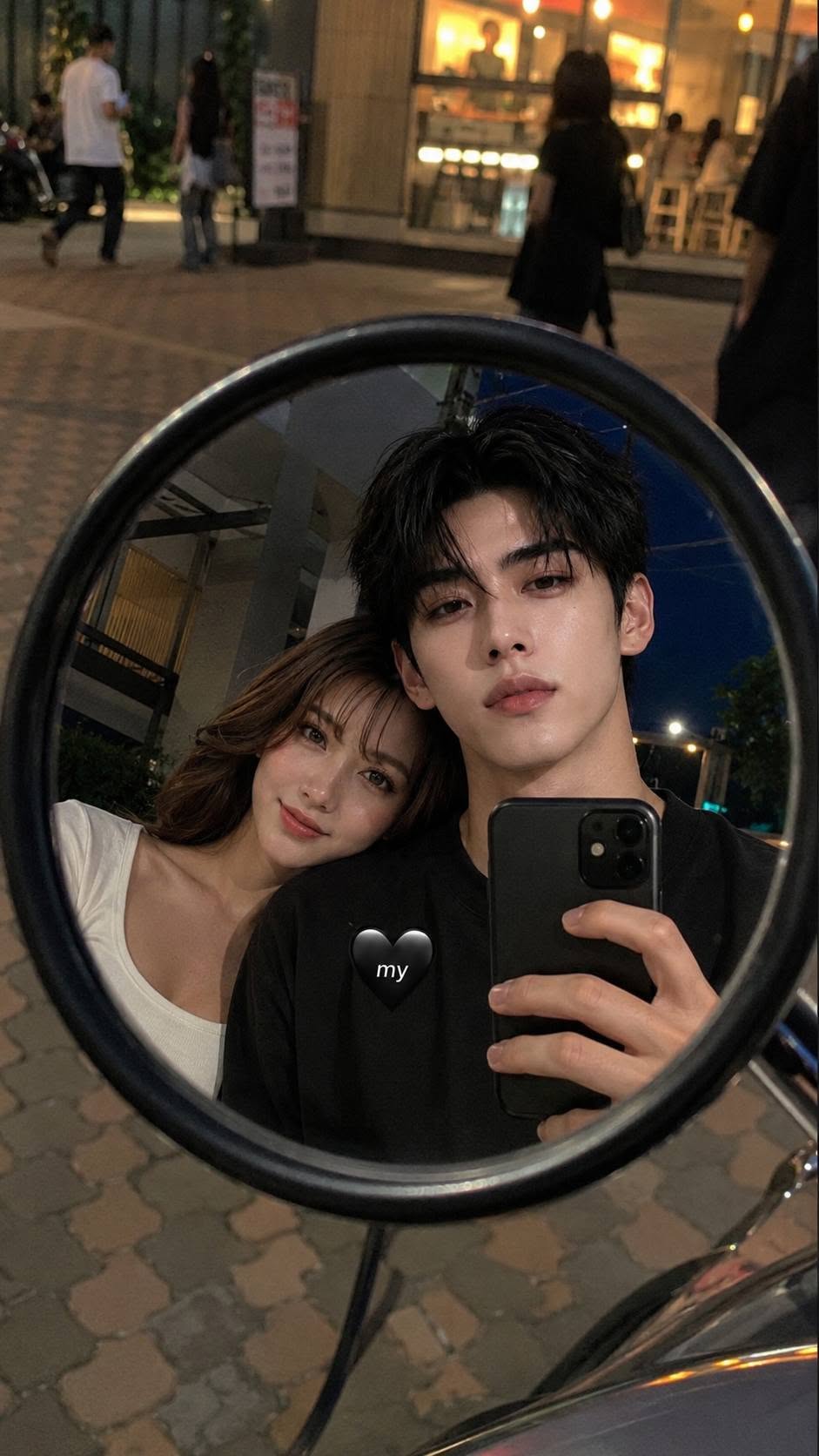 A candid smartphone mirror selfie of a couple captured in the reflection of a mo — Google Gemini AI Prompt