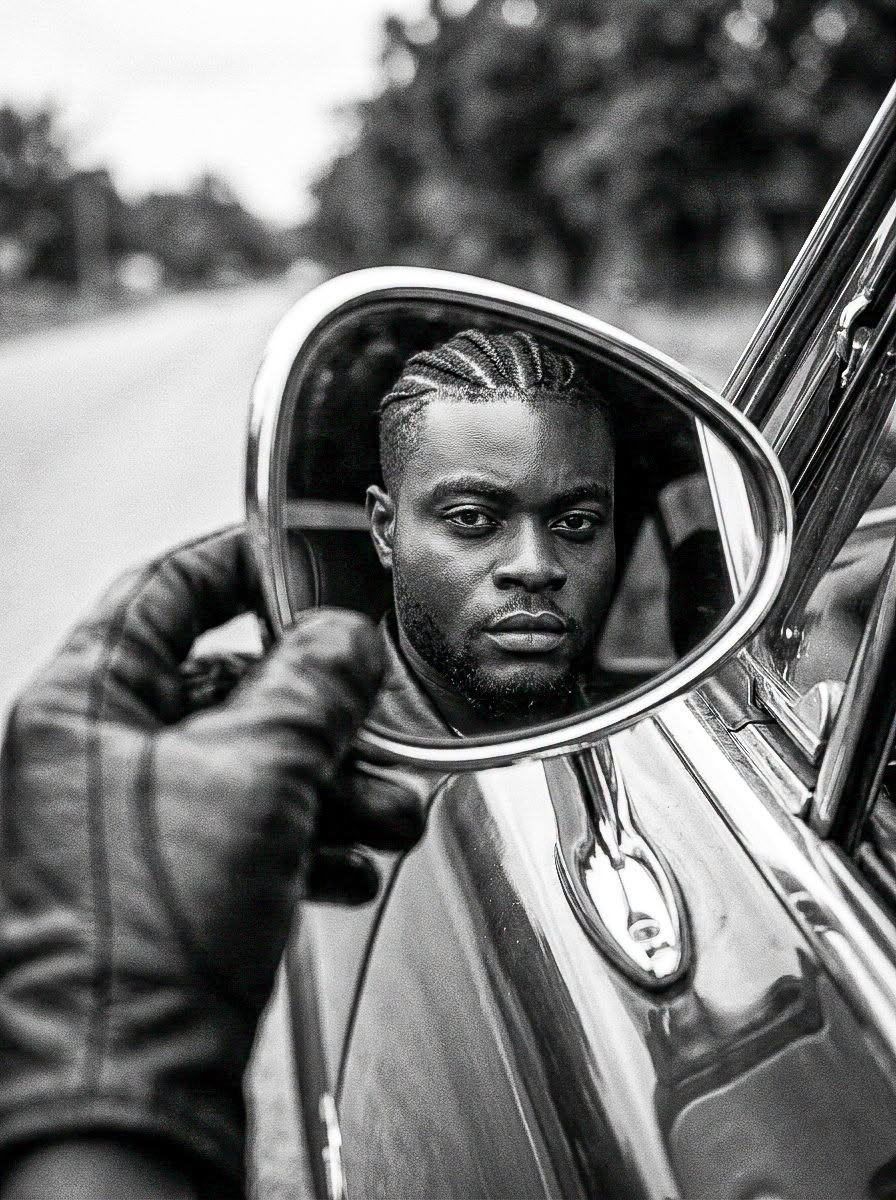 Create a B&W high contrast cinematic close-up through classic car’s teardrop sid — DALL-E AI Image Prompt