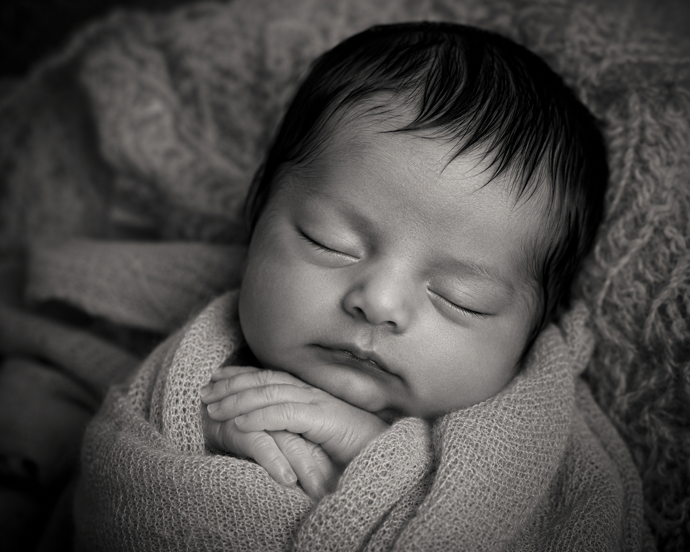 generate a sample image: Transform **[BABY\'S PHOTO]** into a timeless black-and — DALL-E AI Image Prompt