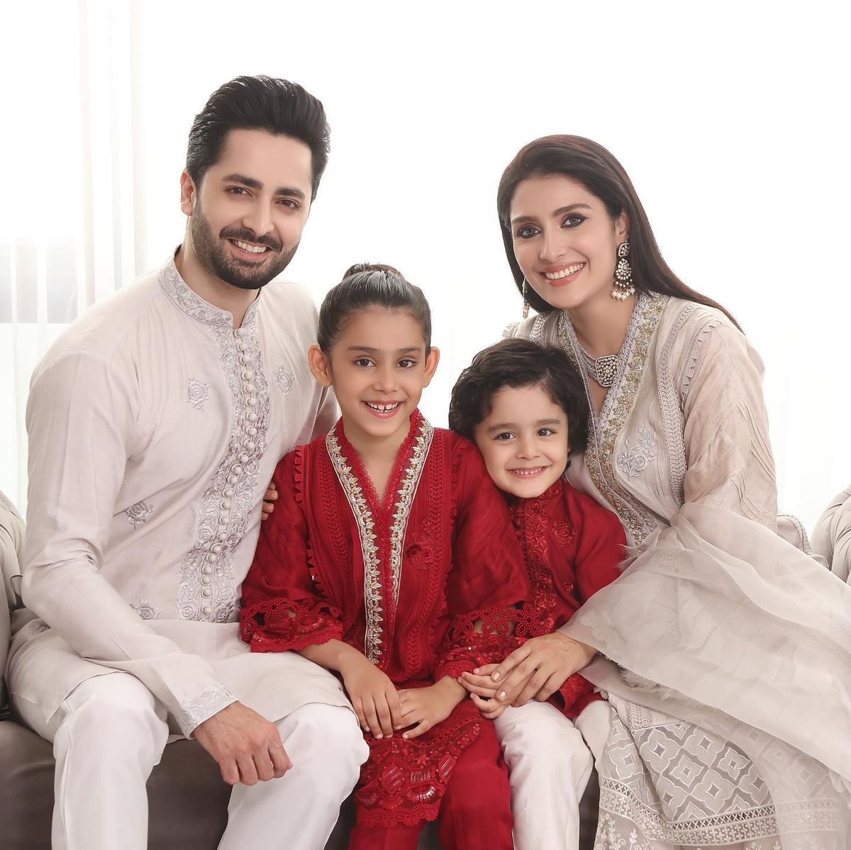 Create an ultra-realistic 8K studio family portrait of a happy South Asian famil — Google Gemini AI Image Prompt