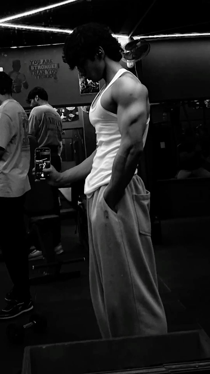 ultra photorealistic black and white cinematic gym mirror selfie, side profile o — Google Gemini AI Image Prompt
