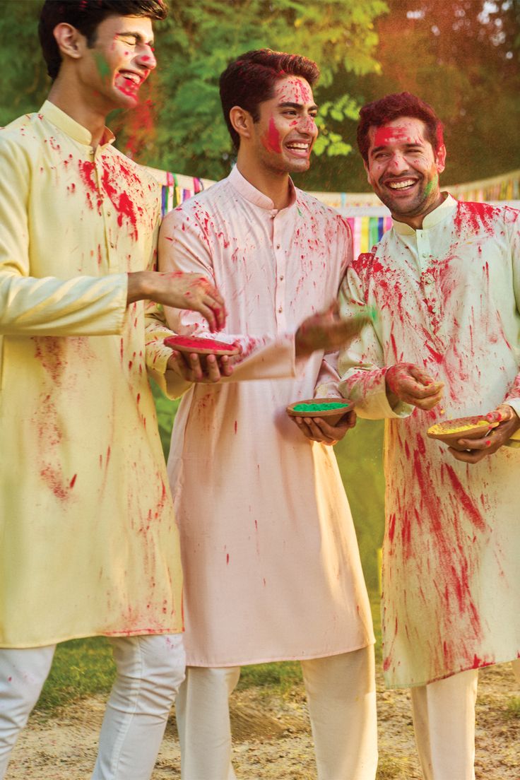 TASK: Recreate this exact 3-person Holi image but with faces from REFERENCE IMAG — Google Gemini AI Image Prompt