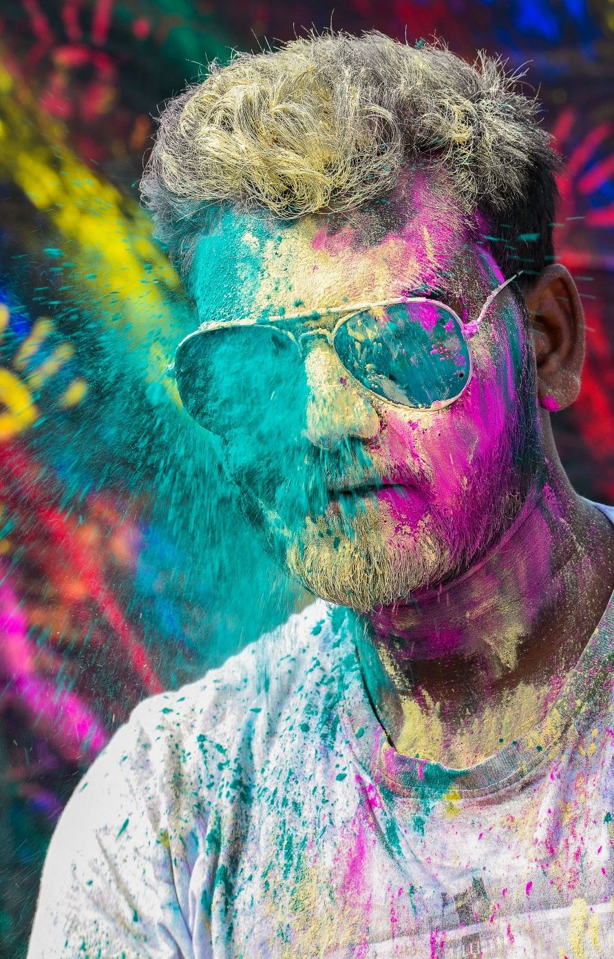 Create an ultra-realistic professional Holi festival portrait using the uploaded — DALL-E AI Image Prompt