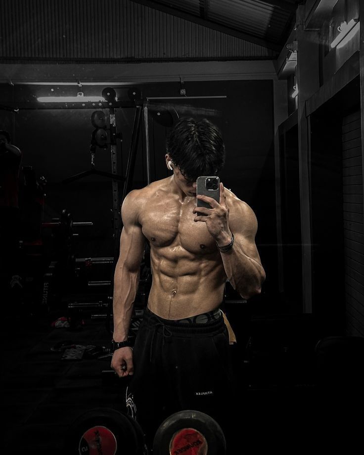 ultra photorealistic dark moody aesthetic gym mirror selfie of a young muscular  — Google Gemini AI Image Prompt