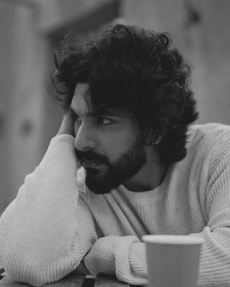 moody black and white cinematic portrait of [SUBJECT: young handsome man mid 20s — DALL-E AI Prompt