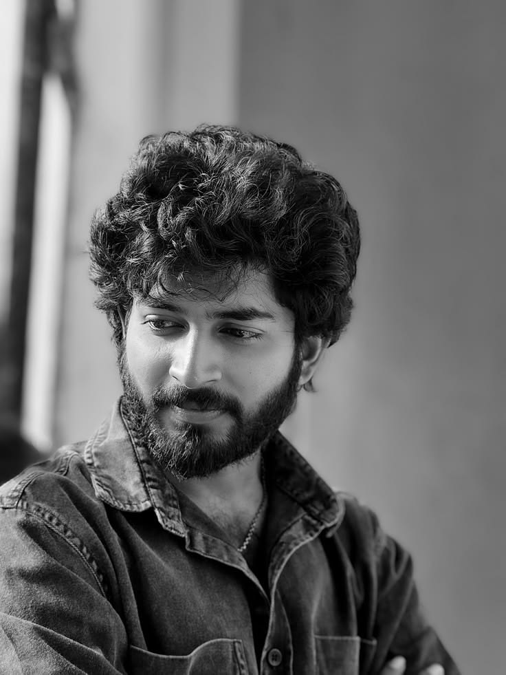 fine art black and white portrait of [SUBJECT: young South Indian handsome man m — DALL-E AI Prompt