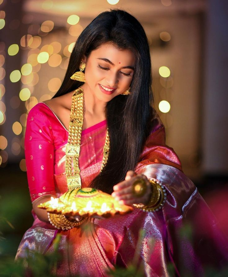 cinematic serene Diwali pink silk saree long haar diya thali portrait of [SUBJEC — DALL-E AI Image Prompt