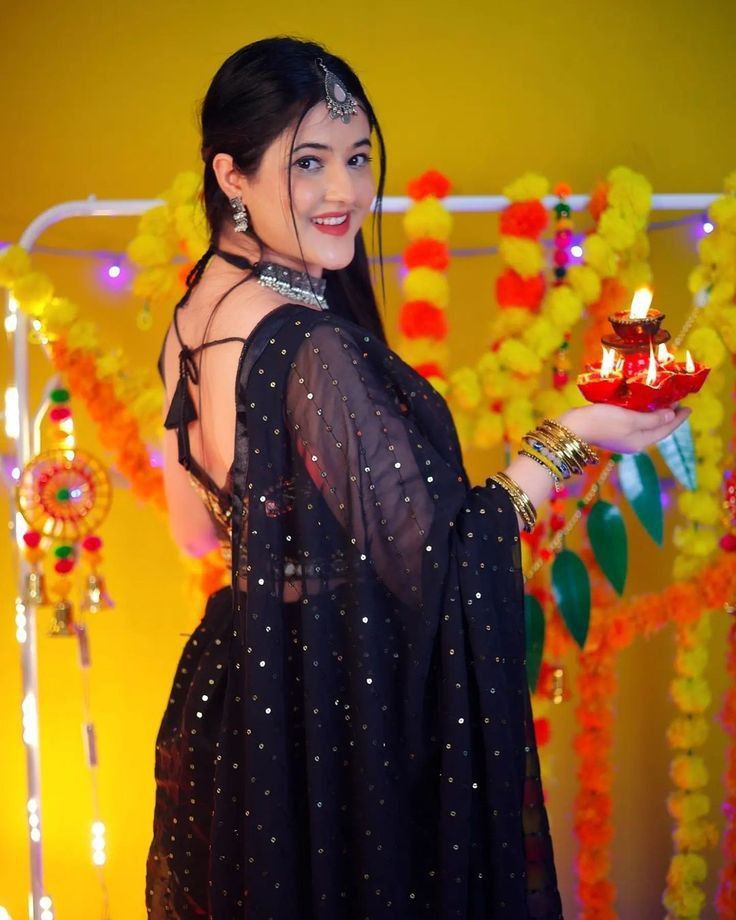 cinematic backless Diwali diya tower black saree portrait of [SUBJECT: beautiful — DALL-E AI Image Prompt