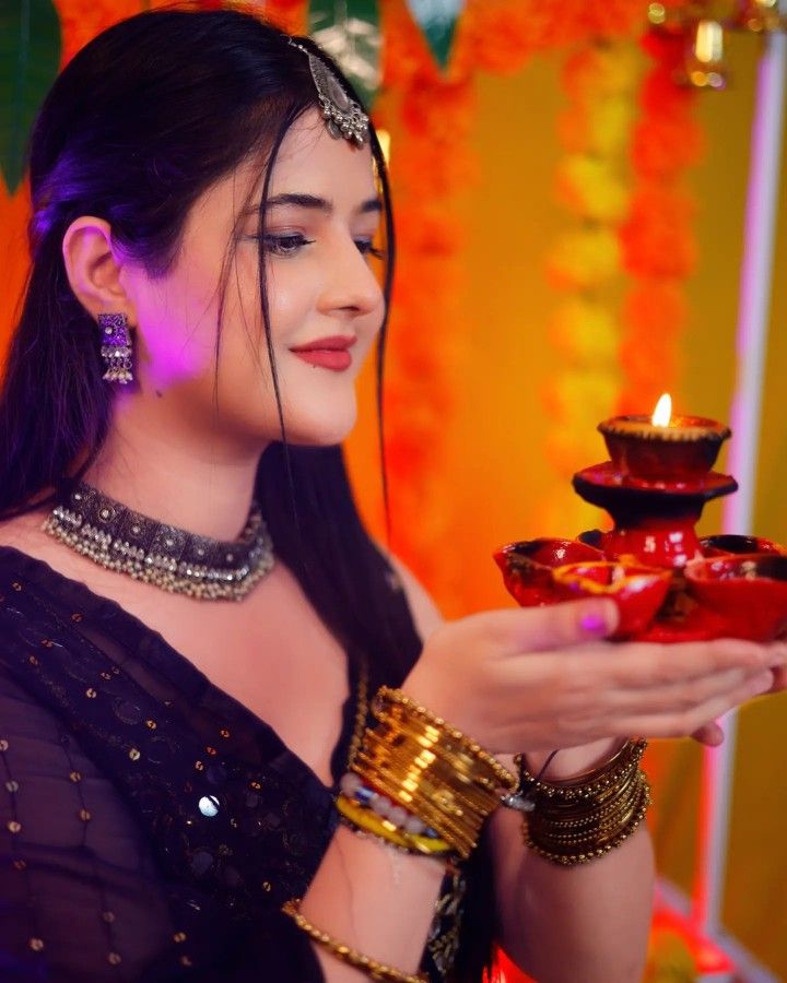 cinematic close-up Diwali diya tower black saree portrait of [SUBJECT: beautiful — DALL-E AI Image Prompt