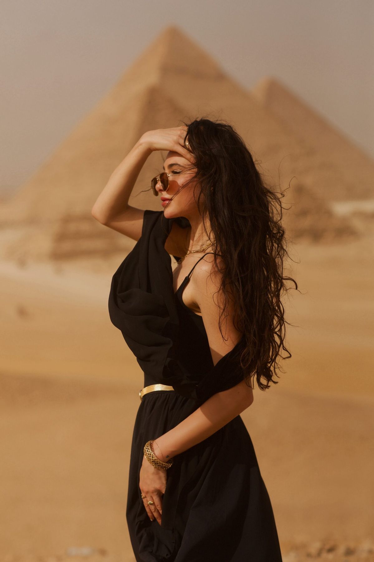 cinematic luxury desert fashion editorial of [SUBJECT: stunning beautiful woman  — DALL-E AI Image Prompt