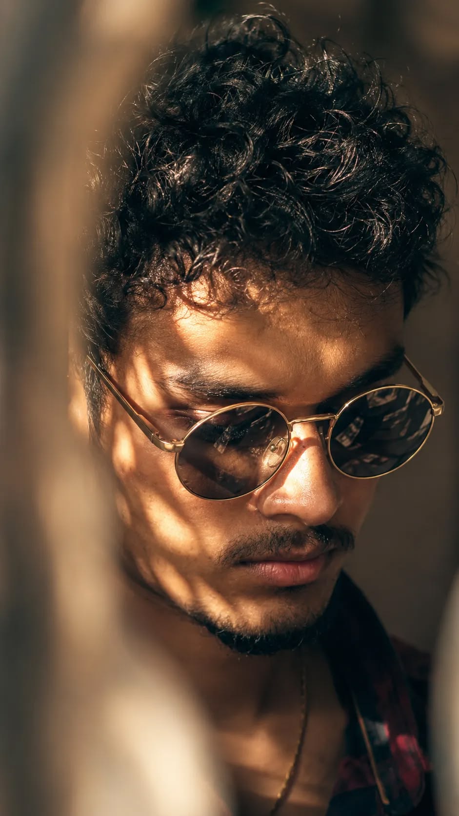 sunlight shadow portrait of [SUBJECT - e.g., a young man with thick curly black  — DALL-E AI Prompt
