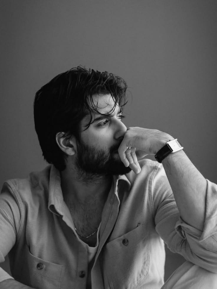 black and white editorial portrait of [SUBJECT - e.g., a young man with dark wav — DALL-E AI Image Prompt